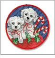 A Kittens & Puppies Christmas Embroidery Designs on CD from the Vermillion Stitchery