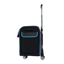 Rolling Goat™ 2.0 side profile showing blue-trimmed exterior pocket and extended telescoping handle on 360° wheels.
