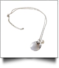 Silver-Tone Medallion with Pearl Accent and Chain